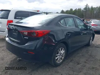 2015 Mazda Mazda3 i Touring with VIN JM1BM1V77F1226189, listed as a IAAI auction lot 41838696 with 146,764 mi miles. Bid and sale history available at carsss.com. Image 4.