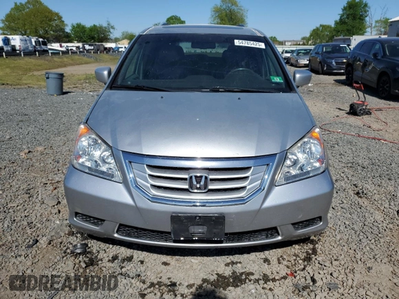 2010 Honda Odyssey EX-L with VIN 5FNRL3H76AB114542, listed as a Copart auction lot 54785425 with 104,239 mi miles and Salvage Title. Bid and sale history available at DreamBid. Image 5.