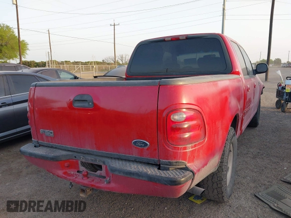 2001 Ford F-150 XLT with VIN 1FTRW07W61KF51667, listed as a IAAI auction lot 41846904 with 187,076 mi miles and . Bid and sale history available at DreamBid. Image 4.
