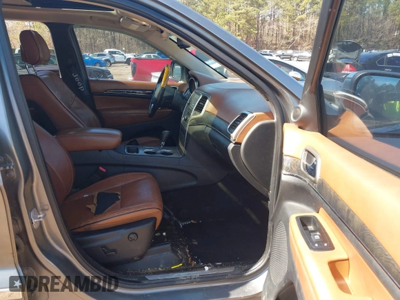 2012 Jeep Grand Cherokee Overland with VIN 1C4RJECT7CC105614, listed as a IAAI auction lot 41629174 with 264,756 mi miles. Bid and sale history available at carsss.com. Image 5.