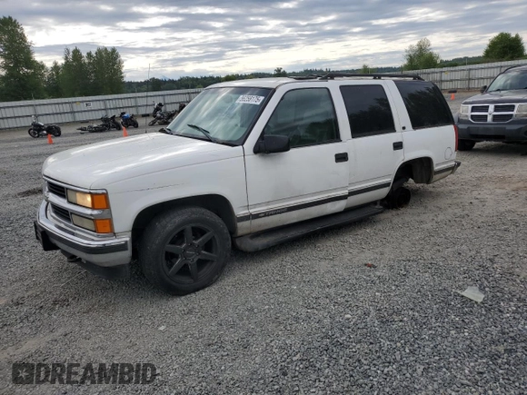 1999 Chevrolet Tahoe Z71 with VIN 1GNEK13R1XJ365475, listed as a Copart auction lot 56258175 with 184,647 mi miles and Clean Title. Bid and sale history available at DreamBid. Image 1.