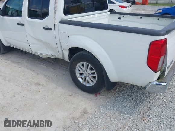 2018 Nissan Frontier SV with VIN 1N6DD0ER2JN716476, listed as a IAAI auction lot 42467770 with 45,659 mi miles and . Bid and sale history available at DreamBid. Image 3.