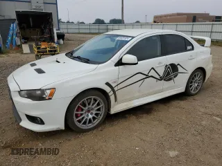 2014 Mitsubishi Lancer Evolution GSR with VIN JA32W8FV5EU017545, listed as a Copart auction lot 69681524 with 118,190 mi miles and Salvage Title. Bid and sale history available at carsss.com. Image 1.