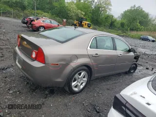 2011 Chevrolet Malibu 1LS with VIN 1G1ZB5E10BF200563, listed as a Copart auction lot 56359625 with 130,820 mi miles and Salvage Title. Bid and sale history available at DreamBid. Image 3.