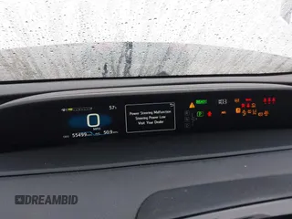 2021 Toyota Prius L Eco with VIN JTDKAMFU6M3150707, listed as a IAAI auction lot 41867272 with 55,499 mi miles and . Bid and sale history available at DreamBid. Image 7.