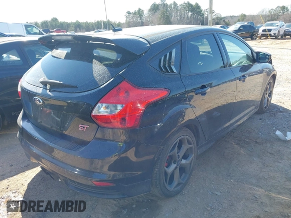 2014 Ford Focus ST with VIN 1FADP3L99EL191826, listed as a IAAI auction lot 41526553 with 131,131 mi miles and . Bid and sale history available at carsss.com. Image 4.