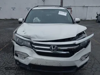 2016 Honda Pilot EX-L with VIN 5FNYF6H78GB092265, listed as a IAAI auction lot 41312700 with 52,101 mi miles. Bid and sale history available at carsss.com. Image 12.