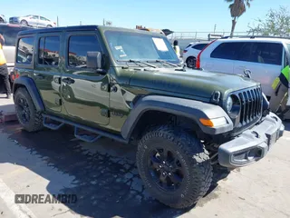 2022 Jeep Wrangler Unlimited Sport with VIN 1C4HJXDG5NW113205, listed as a IAAI auction lot 41836171 with 30,446 mi miles and . Bid and sale history available at DreamBid. Image 1.