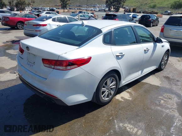 2016 Kia Optima LX with VIN 5XXGT4L3XGG054286, listed as a IAAI auction lot 41924937 with 146,555 mi miles. Bid and sale history available at carsss.com. Image 4.