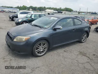 2006 Scion tC z VIN JTKDE177X60123771, wystawiony jako Copart lot #59763245 z przebiegiem 231 959 mil mil oraz Szkoda całkowita • Salvage title. Historia ofert i sprzedaży dostępna na DreamBid. Obrazek 1.