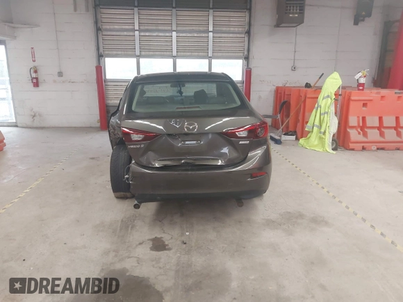 2017 Mazda 3 Touring z VIN JM1BN1V78H1142186, wystawiony jako IAAI lot #42508211 z przebiegiem 109 082 mil mil oraz . Historia ofert i sprzedaży dostępna na DreamBid. Obrazek 16.