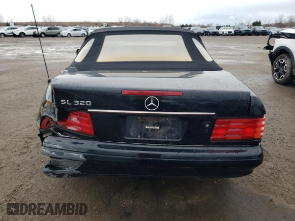 1997 Mercedes-Benz SL 500 z VIN WDBFA63F5VF145337, wystawiony jako Copart lot #79991204 z przebiegiem 134 424 mil mil oraz Szkoda całkowita • Salvage title. Historia ofert i sprzedaży dostępna na DreamBid. Obrazek 6.