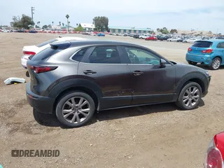 2021 Mazda CX-30 Select with VIN 3MVDMABL5MM210517, listed as a IAAI auction lot 42245033 with 191,303 mi miles and . Bid and sale history available at DreamBid. Image 13.