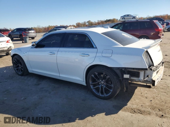 2015 Chrysler 300 C with VIN 2C3CCAET9FH922210, listed as a Copart auction lot 80310864 with 118,931 mi miles and Salvage Title. Bid and sale history available at DreamBid. Image 2.