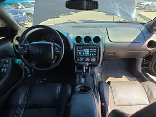 2002 Pontiac Firebird Formula z VIN 2G2FV22G222170769, wystawiony jako Copart lot #56757455 z przebiegiem 120 282 mil mil oraz Tytuł czysty. Historia ofert i sprzedaży dostępna na DreamBid. Obrazek 9.