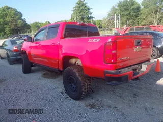 2020 Chevrolet Colorado 4WD Z71 with VIN 1GCGTDEN6L1215253, listed as a IAAI auction lot 42343032 with 61,632 mi miles and . Bid and sale history available at DreamBid. Image 3.