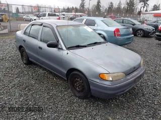 1997 Hyundai Accent z VIN KMHVF24N2VU365832, wystawiony jako IAAI lot #41549953 z przebiegiem 168 072 mil mil oraz . Historia ofert i sprzedaży dostępna na DreamBid. Obrazek 1.