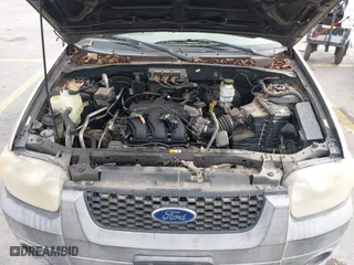 2007 Ford Escape XLT with VIN 1FMYU03157KB25095, listed as a IAAI auction lot 41501314 with 131,738 mi miles. Bid and sale history available at carsss.com. Image 10.