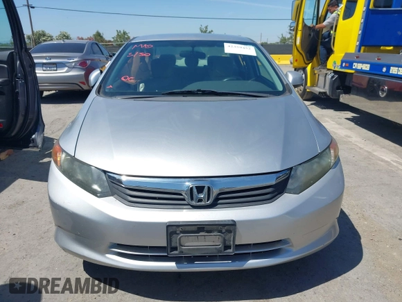 2012 Honda Civic LX z VIN 19XFB2F50CE332101, wystawiony jako IAAI lot #42359452 z przebiegiem 132 170 mil mil oraz . Historia ofert i sprzedaży dostępna na DreamBid. Obrazek 12.