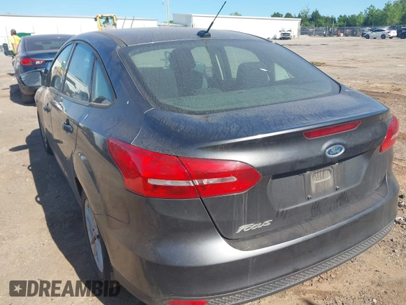 2017 Ford Focus SE with VIN 1FADP3F22HL341553, listed as a IAAI auction lot 42305588 with 165,016 mi miles and . Bid and sale history available at DreamBid. Image 3.