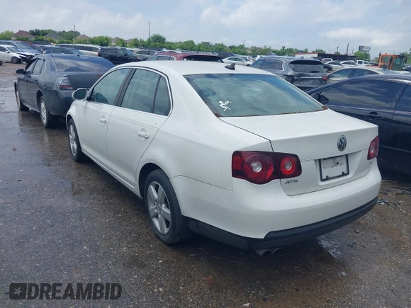 2009 Volkswagen Jetta Sedan SE with VIN 3VWRM71K19M076953, listed as a IAAI auction lot 42110365 with 182,208 mi miles. Bid and sale history available at carsss.com. Image 3.
