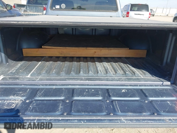 1998 Toyota Tacoma with VIN 4TANL42N6WZ127963, listed as a IAAI auction lot 41861071 with 99,749 mi miles and . Bid and sale history available at DreamBid. Image 8.