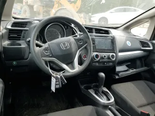 2015 Honda Fit EX-L with VIN 3HGGK5H81FM710337, listed as a Copart auction lot 54482965 with 111,433 mi miles and Salvage Title. Bid and sale history available at DreamBid. Image 8.