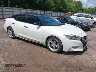 2017 Nissan Maxima Platinum z VIN 1N4AA6AP0HC364760, wystawiony jako IAAI lot #42624171 z przebiegiem 125 992 mil mil oraz . Historia ofert i sprzedaży dostępna na DreamBid. Obrazek 1.
