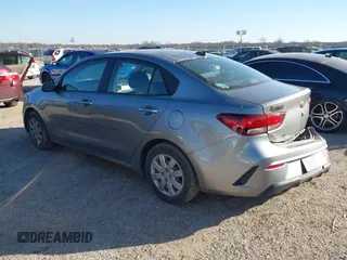 2021 Kia Rio LX with VIN 3KPA24AD8ME377938, listed as a IAAI auction lot 41465632 with 62,964 mi miles. Bid and sale history available at carsss.com. Image 3.
