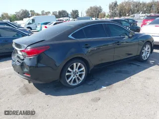 2014 Mazda Mazda6 i Touring with VIN JM1GJ1V69E1155386, listed as a IAAI auction lot 41973800 with 250,808 mi miles. Bid and sale history available at carsss.com. Image 4.