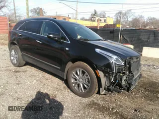 2022 Cadillac XT5 AWD Premium Luxury with VIN 1GYKNDR4XNZ164098, listed as a IAAI auction lot 41822372 with 32,644 mi miles and . Bid and sale history available at DreamBid. Image 1.