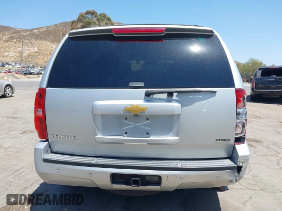 2012 Chevrolet Tahoe LT z VIN 1GNSCBE06CR255554, wystawiony jako IAAI lot #42544690 z przebiegiem 136 070 mil mil oraz . Historia ofert i sprzedaży dostępna na DreamBid. Obrazek 16.