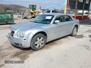 2006 Chrysler 300 Touring with VIN 2C3KK53G36H150931, listed as a IAAI auction lot 41934358 with 110,136 mi miles. Bid and sale history available at carsss.com. Image 2.