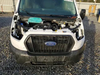 2023 Ford Transit Cargo with VIN 1FTYE1Y8XPKB09455, listed as a Copart auction lot 86811774 with 12,918 mi miles and Clean Title. Bid and sale history available at DreamBid. Image 12.