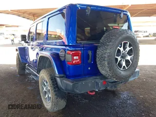 2020 Jeep Wrangler Unlimited Rubicon z VIN 1C4HJXFG1LW234257, wystawiony jako IAAI lot #42269173 z przebiegiem 44 335 mil mil oraz . Historia ofert i sprzedaży dostępna na DreamBid. Obrazek 3.