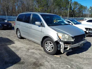2007 Honda Odyssey EX-L z VIN 5FNRL38727B415866, wystawiony jako IAAI lot #41599623 z przebiegiem 259 847 mil mil oraz . Historia ofert i sprzedaży dostępna na DreamBid. Obrazek 1.