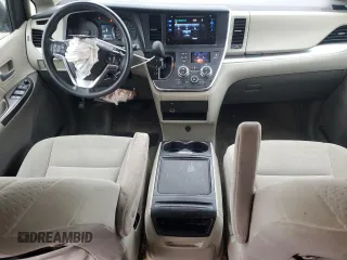 2015 Toyota Sienna LE AAS with VIN 5TDKK3DC3FS572405, listed as a Copart auction lot 58141975 with 146,820 mi miles and Salvage title. Bid and sale history available at DreamBid. Image 8.