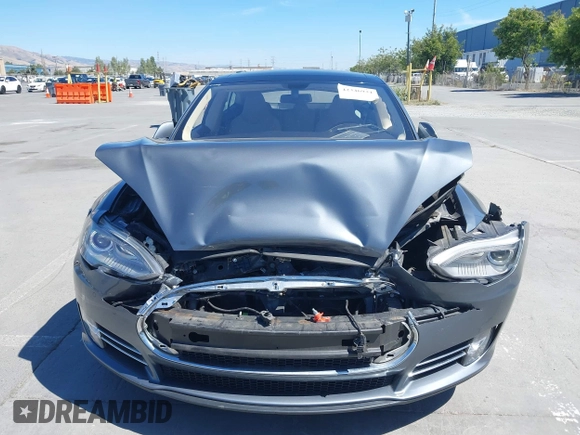 2014 Tesla Model S 60 z VIN 5YJSA1H17EFP33910, wystawiony jako IAAI lot #42346934 z przebiegiem Nie podano mil oraz . Historia ofert i sprzedaży dostępna na DreamBid. Obrazek 10.