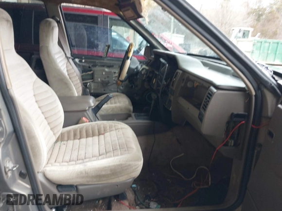 1995 Jeep Grand Cherokee Laredo with VIN 1J4GZ58SXSC697003, listed as a IAAI auction lot 41259889 with 248,595 mi miles. Bid and sale history available at carsss.com. Image 5.