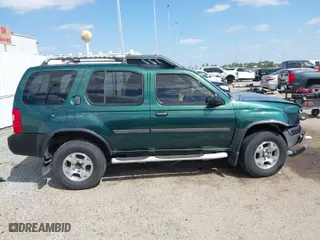 2001 Nissan Xterra XE with VIN 5N1ED28T61C526634, listed as a IAAI auction lot 41764950 with 243,574 mi miles. Bid and sale history available at carsss.com. Image 13.