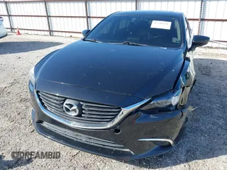 2016 Mazda 6 i Grand Touring with VIN JM1GJ1W50G1478699, listed as a IAAI auction lot 41711211 with 208,720 mi miles and . Bid and sale history available at DreamBid. Image 19.