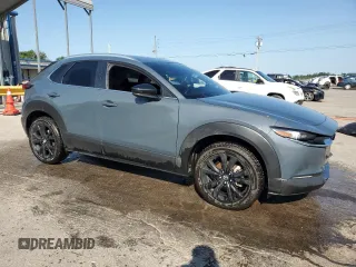 2023 Mazda CX-30 S Carbon Edition with VIN 3MVDMBCM1PM553374, listed as a Copart auction lot 62080975 with 51,527 mi miles and Salvage title. Bid and sale history available at DreamBid. Image 4.