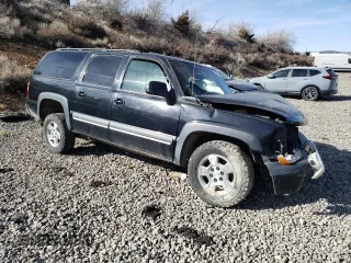 2002 Chevrolet Suburban LT with VIN 1GNFK16T02J261631, listed as a Copart auction lot 46933875 with Not provided miles and Salvage title. Bid and sale history available at DreamBid. Image 4.