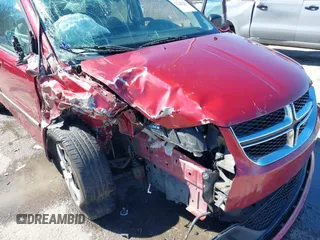 2014 Dodge Grand Caravan American Value with VIN 2C4RDGBG6ER223820, listed as a IAAI auction lot 41705097 with 213,180 mi miles and . Bid and sale history available at DreamBid. Image 6.