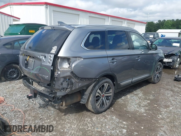 2017 Mitsubishi Outlander SE with VIN JA4AD3A35HZ057699, listed as a IAAI auction lot 42337414 with 85,950 mi miles and . Bid and sale history available at DreamBid. Image 4.