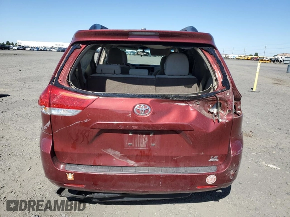 2014 Toyota Sienna LE with VIN 5TDJK3DC5ES093932, listed as a Copart auction lot 63611985 with 142,044 mi miles and Salvage title. Bid and sale history available at DreamBid. Image 6.