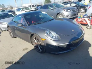 2019 Porsche 911 Carrera S with VIN WP0AB2A90KS114837, listed as a IAAI auction lot 41709937 with 50,248 mi miles. Bid and sale history available at carsss.com. Image 1.