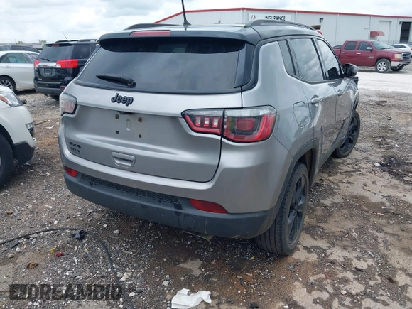2018 Jeep Compass Latitude with VIN 3C4NJDBB8JT323967, listed as a IAAI auction lot 42096644 with 143,761 mi miles and . Bid and sale history available at DreamBid. Image 4.