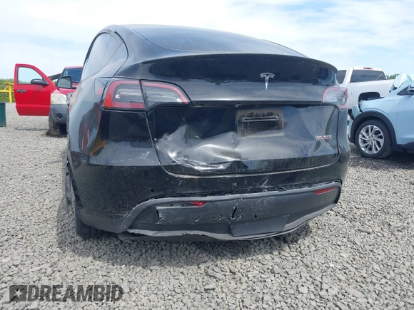 2022 Tesla Model Y Performance z VIN 7SAYGDEF5NF546680, wystawiony jako IAAI lot #42229359 z przebiegiem 55 597 mil mil oraz . Historia ofert i sprzedaży dostępna na DreamBid. Obrazek 6.