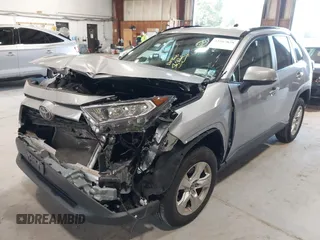 2021 Toyota RAV4 XLE with VIN 2T3P1RFV5MC180890, listed as a IAAI auction lot 42567858 with 56,961 mi miles and . Bid and sale history available at DreamBid. Image 16.